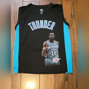 Vintage Oklahoma City Thunder Kevin Durant basketball jersey with apicture on it